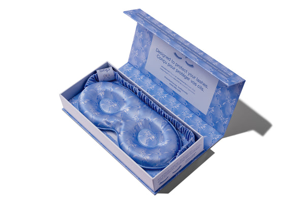 Blue contour sleep mask in packaging on a white background