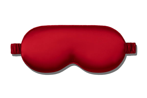 Red sleep mask on a white background