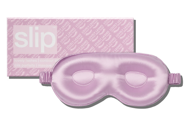 A purple slip silk contour sleep mask designed to protect delicate eyelash extensions, with the brand name 'slip' visible on the packaging.