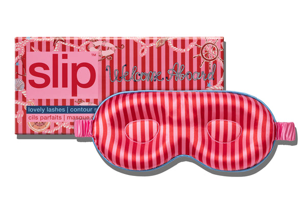 A red and pink striped contour sleep mask designed for eyelash extension wearers, displayed alongside its packaging on white background.