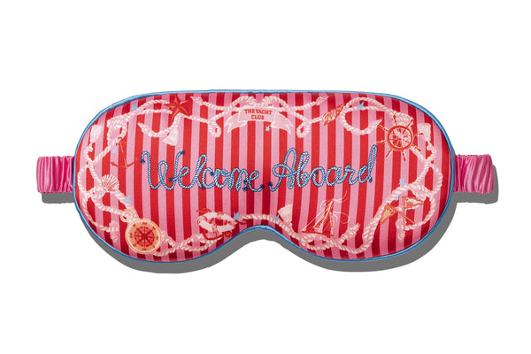 A red and pink striped slip contour sleep mask designed for eyelash extension wearers, on white background.