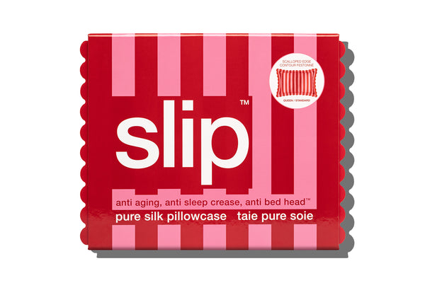 A striped pink slip silk pillowcase box on a white background.