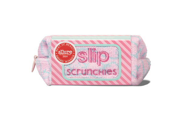 Slip scrunchie complimentary pouch in pink and blue on a white background.