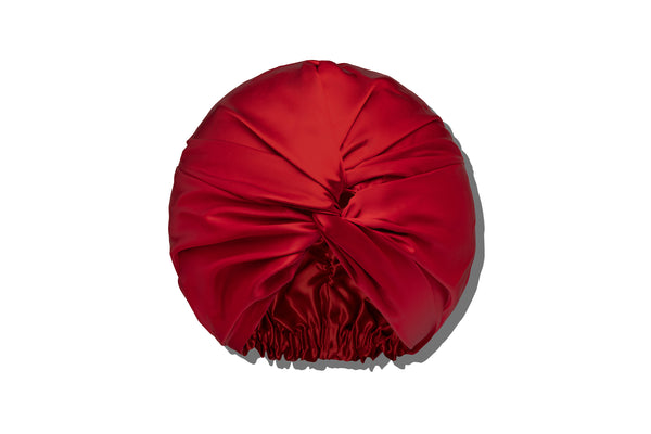 Red silk turban on a white background