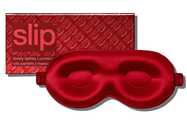Red silk contour sleep mask with 'slip' packaging on a white background