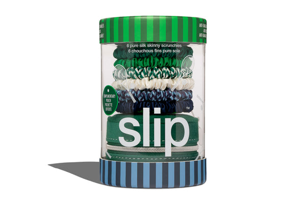 Container of 'slip' silk skinny hair scrunchies and a complimentary pouch with green and blue design on a white background