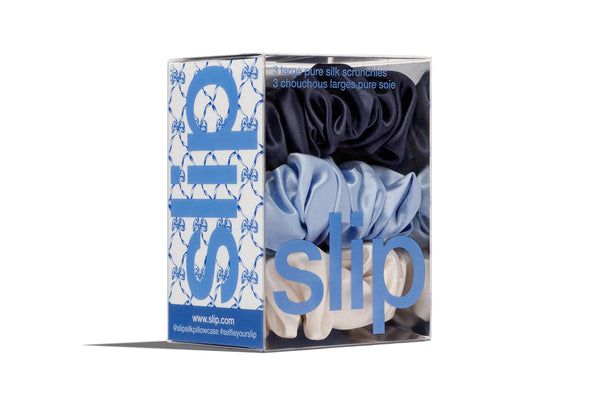 Box of slip large scrunchies with blue and white packaging on a white background