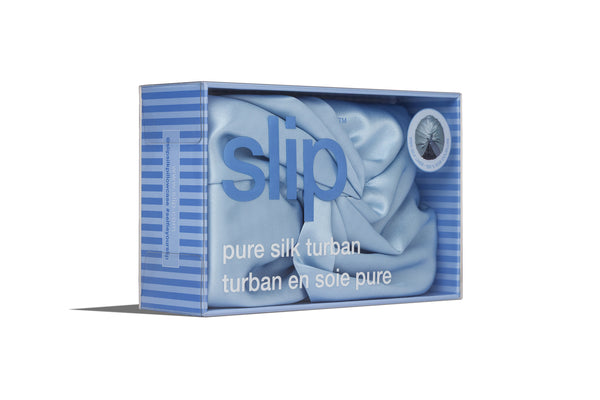 Box of slip pure silk turban with blue packaging on a white background