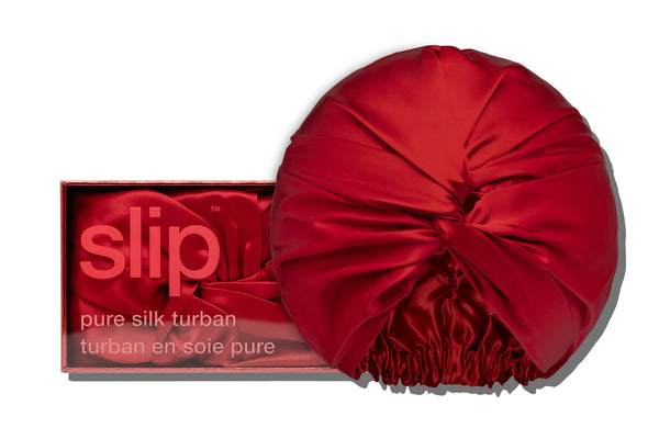 Red pure silk turban with packaging labeled 'slip' on a white background